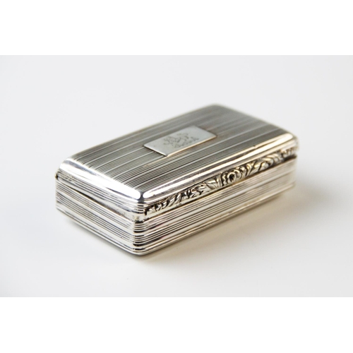 101 - A George IV silver snuff box, 'TS' Birmingham 1829, the rectangular box with striped decoration and ... 