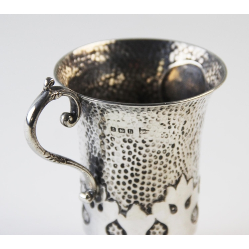 118 - An Edwardian silver christening mug, London 1907, of pedestal form, the body with planished detail a... 