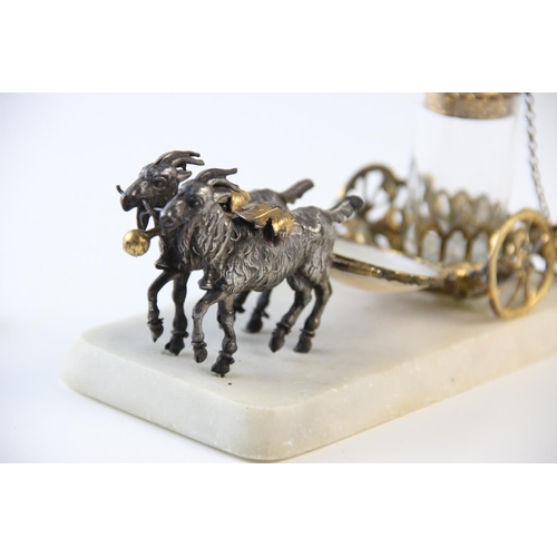 264 - A late 19th century Palais Royale gilt metal thimble chariot, formed as a carriage drawn by two goat... 