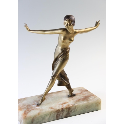 388 - An Art Deco spelter figure, early 20th century, the gilt patinated figure modelled as a girl dancing... 