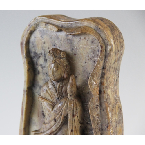 438 - A late 19th century Chinese soapstone carving of Guanyin, 17cm high