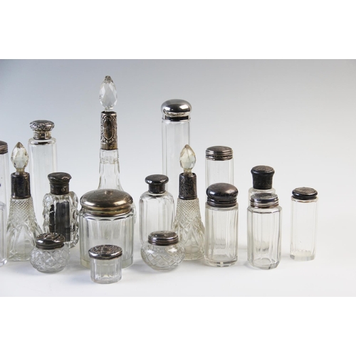 5 - A large selection of silver mounted dressing table jars and bottles, 19th century and later, to incl... 