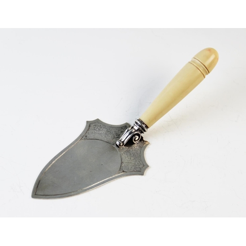 79 - A silver bladed presentation trowel,  Turner & Simpson, Birmingham 1931, un-engraved and with turned... 