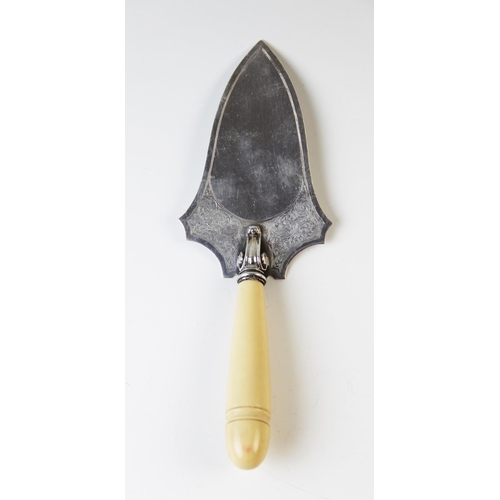 79 - A silver bladed presentation trowel,  Turner & Simpson, Birmingham 1931, un-engraved and with turned... 