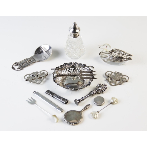 94 - A selection of small silver and plated wares, to include; a silver belt buckle, a silver backed mini... 