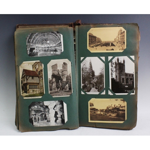 279 - A collection of Edwardian postcards to an album to include topographical interest, greetings cards t... 