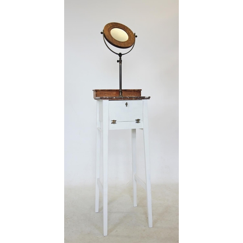 714 - A late 19th century painted shaving stand, the circular revolving mirror above a fitted hinged box a... 