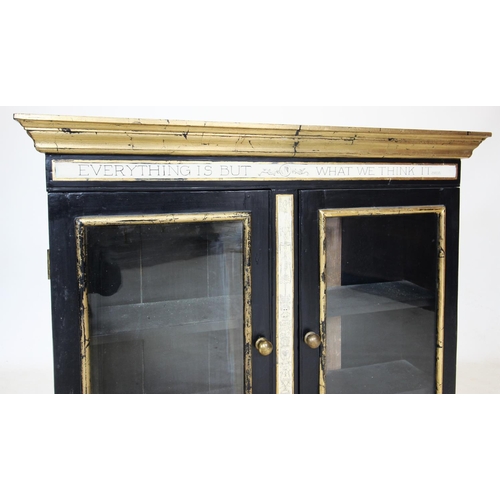 715 - A 19th century and later painted glazed wall cabinet, in a neoclassical style, painted in black with... 