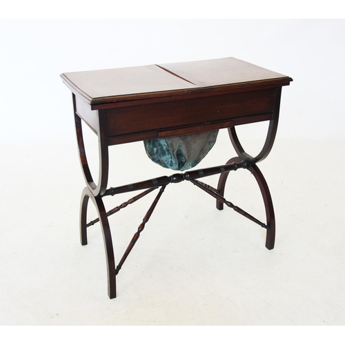 742 - A 19th century mahogany ladies work table, the rectangular table with twin hinged compartments enclo... 