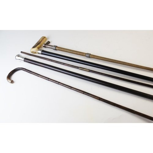 407 - Five assorted walking sticks and canes, to include, a woven cane with wicker effect white metal moun... 