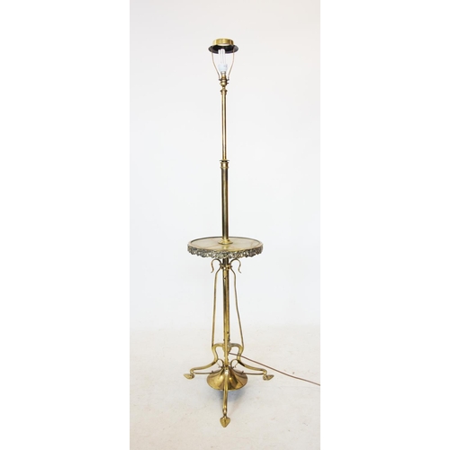 528 - An early 20th century brass and onyx standard lamp table, the telescopic lamp with a circular onyx t... 