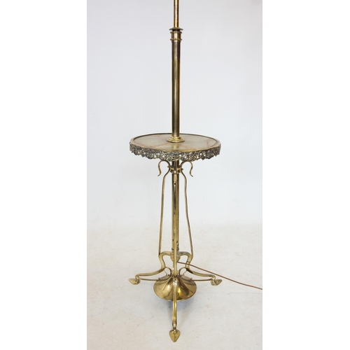 528 - An early 20th century brass and onyx standard lamp table, the telescopic lamp with a circular onyx t... 