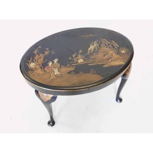 769 - A 1930's Chinoiserie occasional table, of oval form raised on cabriole legs, decorated in lacquer de... 