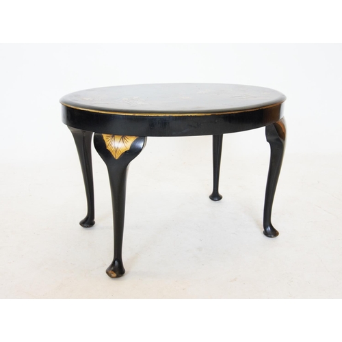 769 - A 1930's Chinoiserie occasional table, of oval form raised on cabriole legs, decorated in lacquer de... 