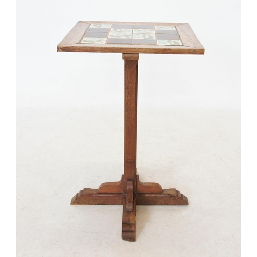 770 - An early 20th century tile top pedestal table, the square top inset with four Art Nouveau tiles, upo... 