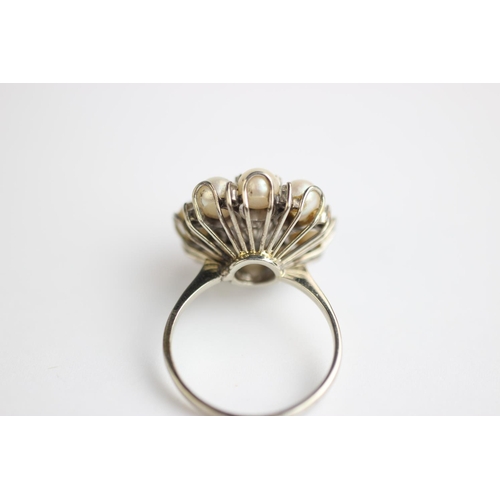 234 - An untested pearl and diamond cluster dress ring, 1960's, designed as a central pearl within diamond... 