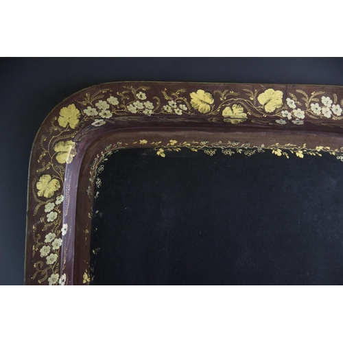 402 - A Victorian papier mache tray stamped 'B Walton & Co Warranted', of rectangular form with gilt flora... 