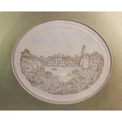 403 - A pair of 19th century cork pictures, the oval vignettes depicting 'Babelsberg' and a further Europe... 