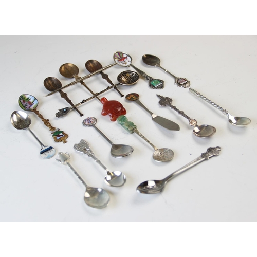 95 - A selection of silver and plated items, to include; a hip flask, assorted condiments, serving implem... 