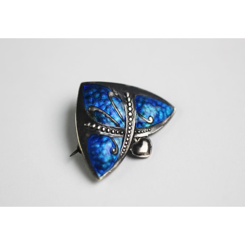 196 - An Edwardian silver and enamel brooch, probably Charles Horner Birmingham 1910, the arch form brooch... 