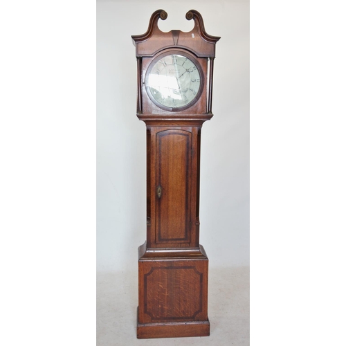 372 - A George III oak and mahogany cross banded thirty hour longcase clock by Joshua Cotterill, the twin ... 