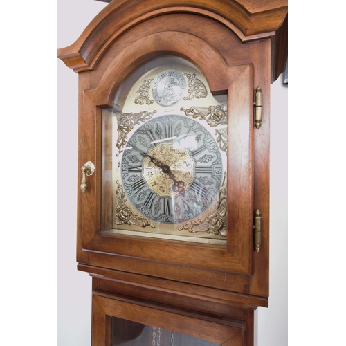 374 - A reproduction mahogany cased longcase clock by Interclock, late 20th century, the arched hood enclo... 