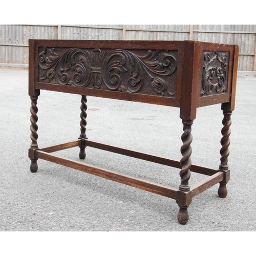 730 - A Victorian and later oak planter, with a removable rectangular cover over four panels carved with s... 