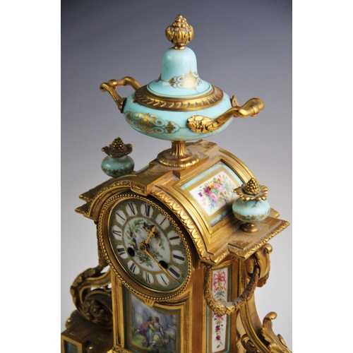 378 - A French 19th century ormolu and porcelain inset 8-day mantel clock, the case of Rococo acanthus and... 