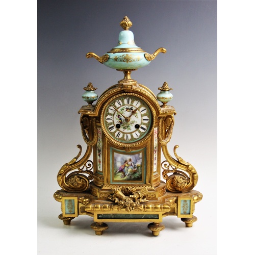 378 - A French 19th century ormolu and porcelain inset 8-day mantel clock, the case of Rococo acanthus and... 