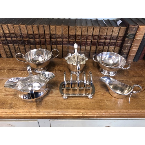 146A - A collection of silver plated wares, to include, a Walker & Hall three piece tea service, a collecti... 