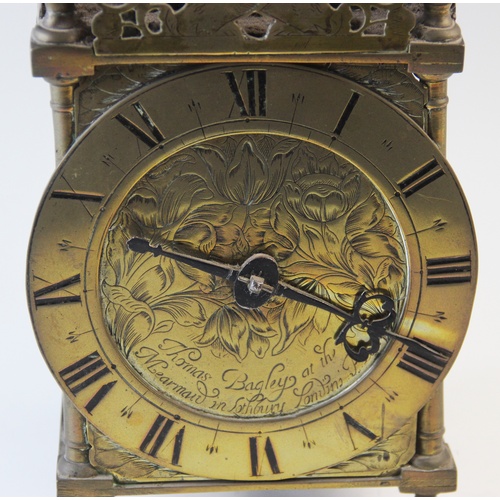 365 - A Charles II brass lantern clock by Thomas Bagley, London, 1665 to 1666, the brass bell strap with a... 