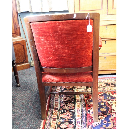 738 - A Victorian oak and upholstered library chair, the padded back within a fluted frame, above down swe... 