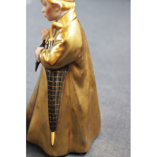 498 - A Royal Copenhagen figure 'The Sandman' model number 1145, with gilt coat and hat, 16cm high