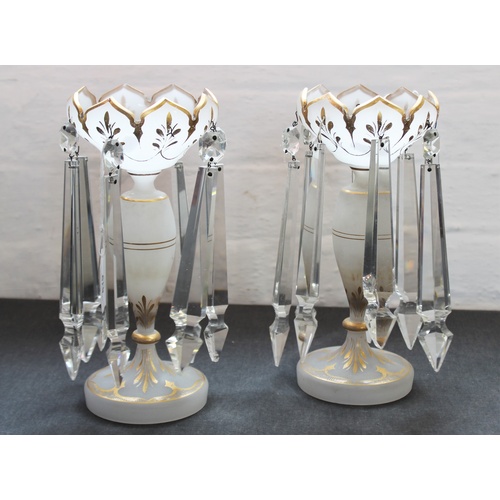 519 - A pair of late 19th/early 20th century glass lustres, of typical form, with recurrent ogee form bord... 