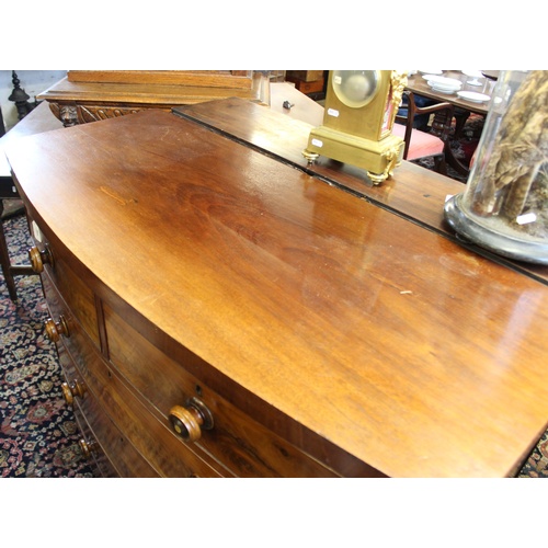 736 - A Victorian mahogany bow front chest of drawers, with two short and three long graduated and cock be... 