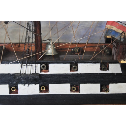 384 - A 19th century and later model ship diorama, the 'Ocean Queen', the three masted vessel modelled wit... 