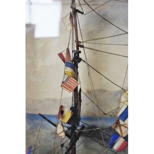 384 - A 19th century and later model ship diorama, the 'Ocean Queen', the three masted vessel modelled wit... 