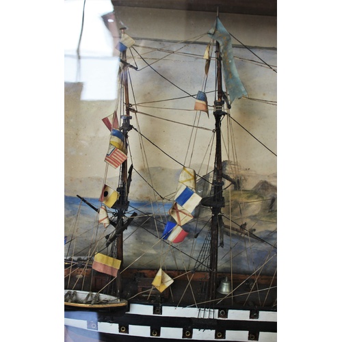 384 - A 19th century and later model ship diorama, the 'Ocean Queen', the three masted vessel modelled wit... 