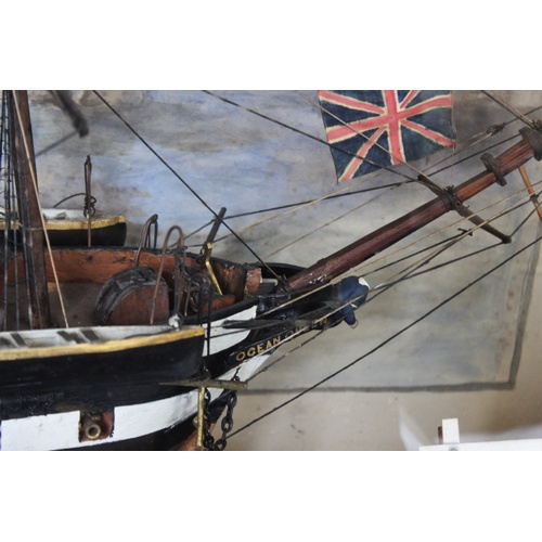 384 - A 19th century and later model ship diorama, the 'Ocean Queen', the three masted vessel modelled wit... 