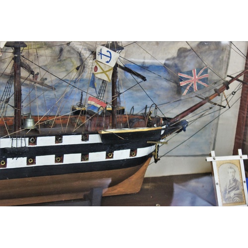 384 - A 19th century and later model ship diorama, the 'Ocean Queen', the three masted vessel modelled wit... 