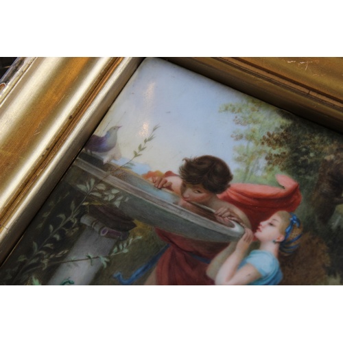 268 - A French enamelled porcelain plaque, after Laure Levy, 'Young Love', indistinctly signed 'M Luce', 2... 