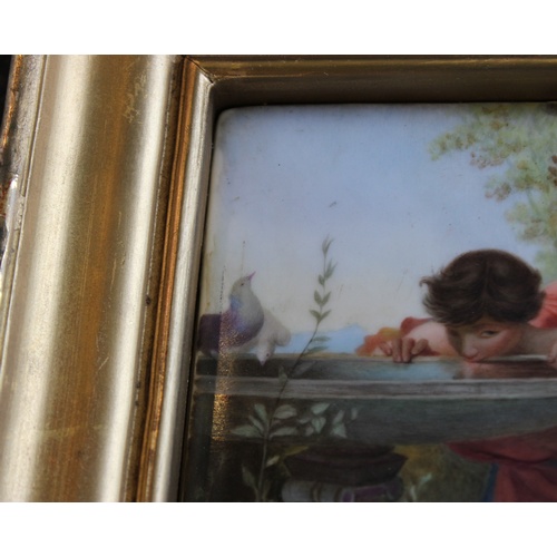 268 - A French enamelled porcelain plaque, after Laure Levy, 'Young Love', indistinctly signed 'M Luce', 2... 