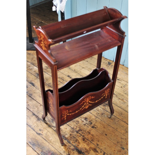 391 - An Edwardian, Regency style inlaid mahogany freestanding book trough, the trough above a single shel... 