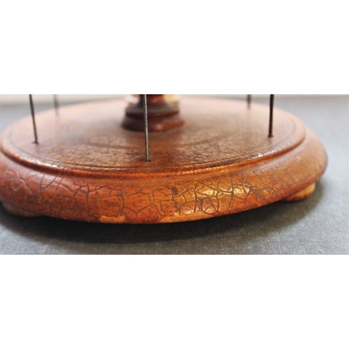 399 - A Victorian treen cotton reel holder, with two graduated tiers, each with six wire holders applied w... 