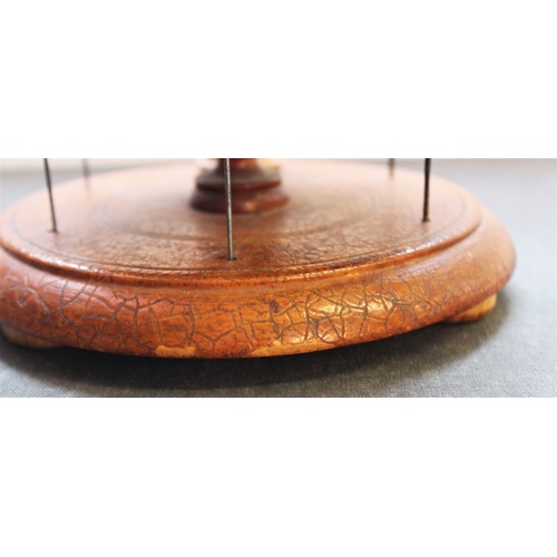 399 - A Victorian treen cotton reel holder, with two graduated tiers, each with six wire holders applied w... 