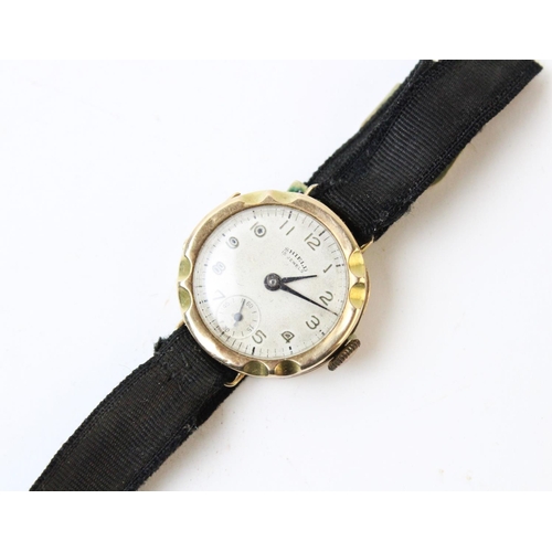 108 - A Lady's vintage 9ct gold wristwatch, the circular cream dial with Arabic numerals and subsidiary se... 