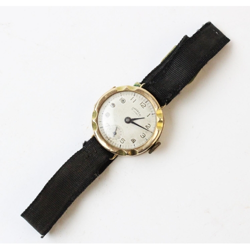 108 - A Lady's vintage 9ct gold wristwatch, the circular cream dial with Arabic numerals and subsidiary se... 