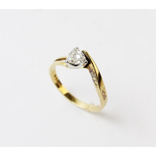 125 - A diamond solitaire ring, comprising a central trilliant cut diamond, width 5mm, length 5mm, claw se... 