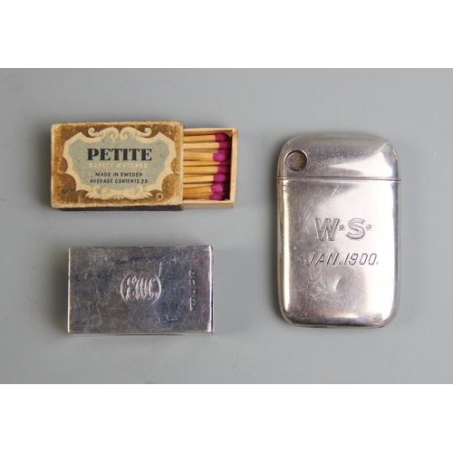 64 - A George V silver vesta sleeve, TH Hazelwood & Co, Birmingham 1915, with engine turned detail and mo... 