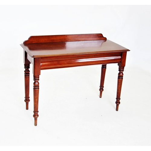 673 - A Victorian mahogany side table, with a galleried back above the rectangular thumb moulded top and s... 